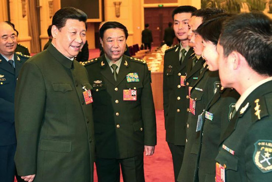 中共中央總書記、中共中央軍委主席習近平出席十二屆全國人大一次會議解放軍代表團全體會議并發(fā)表重要講話。