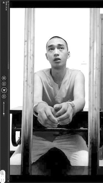 在看守所里的陳明燦。視頻截圖