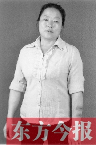 王君榮手臂上的傷痕至今仍很醒目 王君榮手臂上的傷痕至今仍很醒目