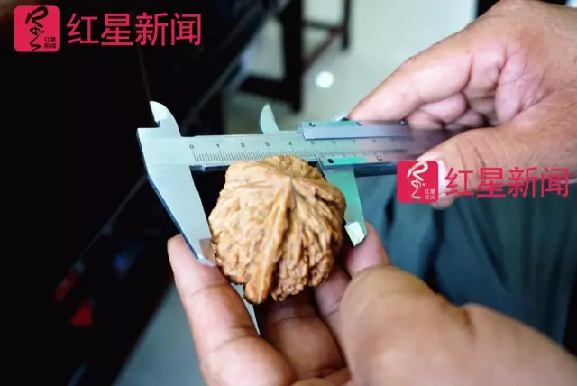 文玩核桃遇冷由幾萬一對(duì)降到5元沒人要？商戶否認(rèn)