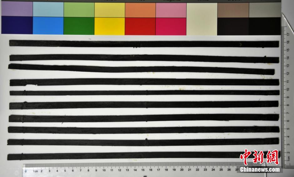 圖為漢代簡牘出土930支竹簡，在四川地區(qū)首次發(fā)現(xiàn)漢代簡牘。