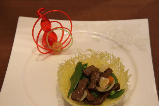 雀巢爆羊柳。 花惠生 供圖