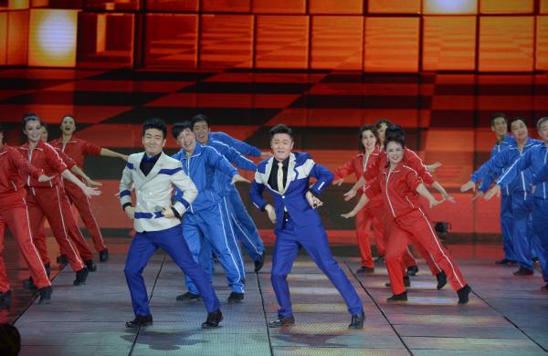 《小蘋果》、《最炫民族風》等廣場舞曲將會有全國統(tǒng)一、編排科學、帶給人正能量的全新動作。 CFP 資料