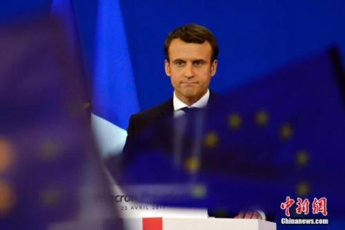 圖為馬克龍?jiān)趹c祝集會(huì)上。中新社記者 龍劍武 攝